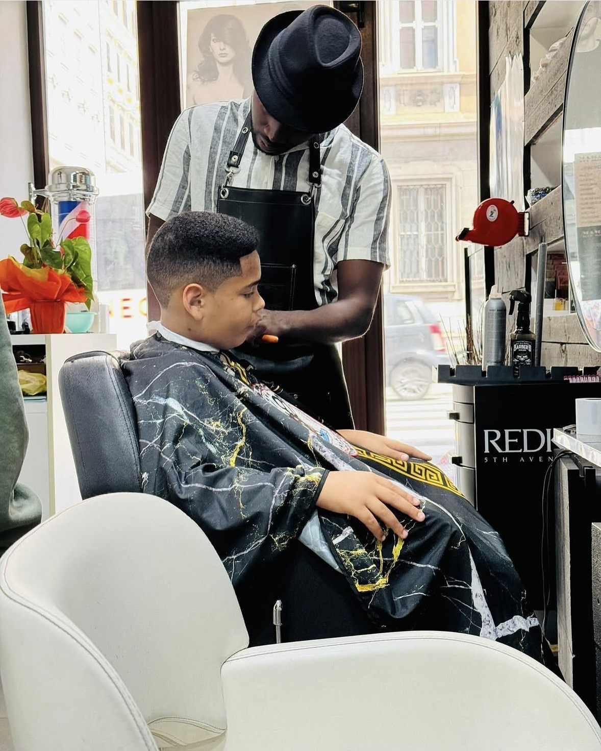 Barber at work in the shop