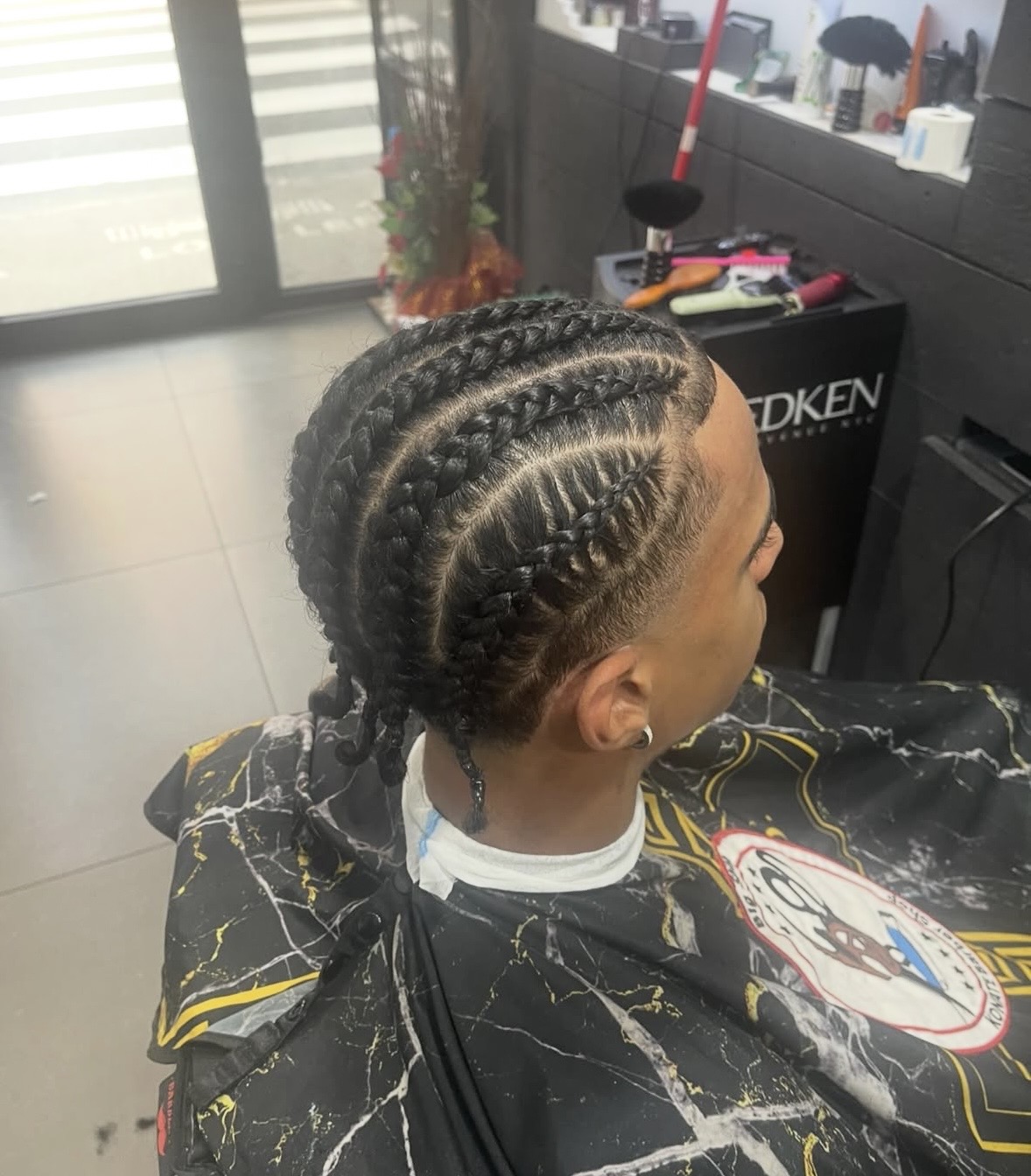 Cornrows braided styling