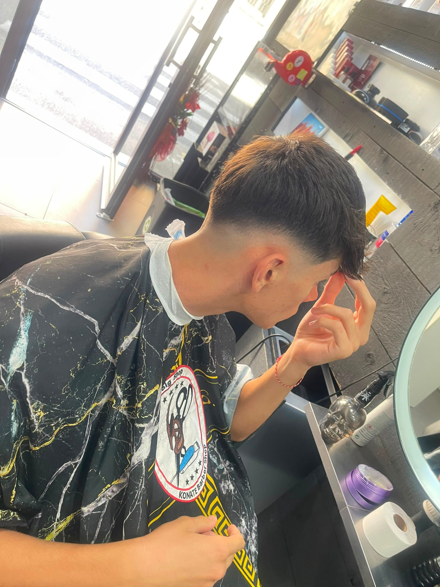 Mid fade with textured fringe